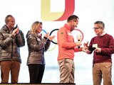 Medaillen für Rodlerinnen und Minister de Maizière